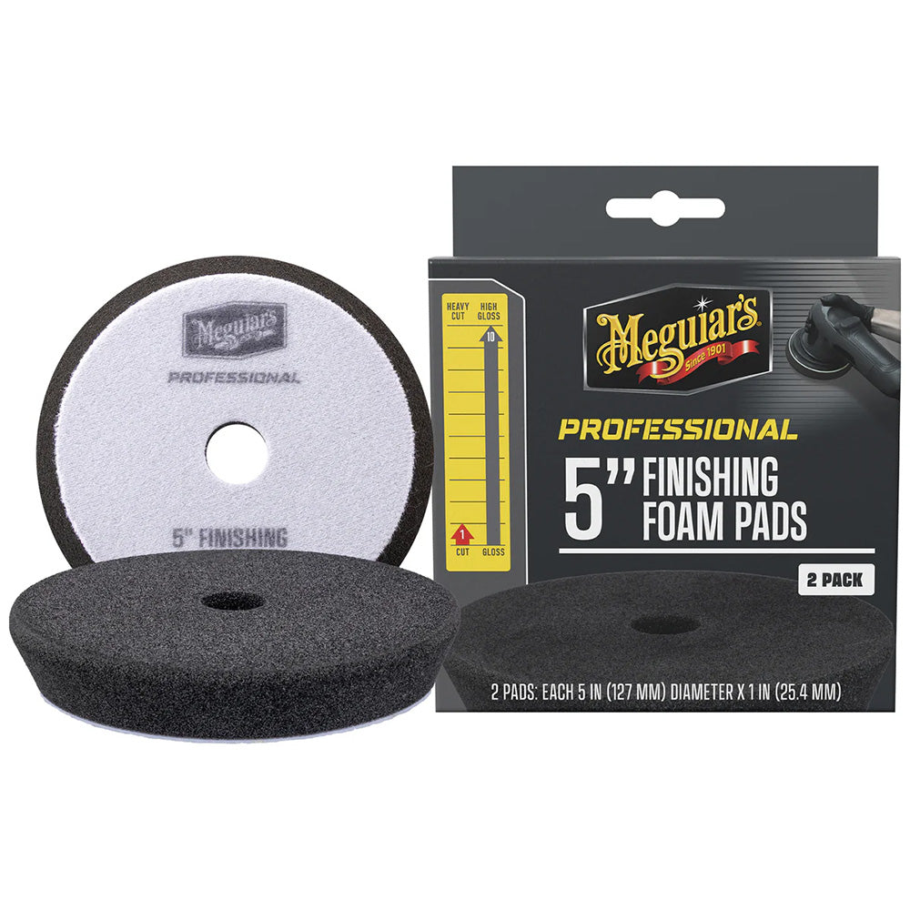 Two Meguiar's Professional 5-inch finishing foam pads for car cleaning and detailing, shown on a plain background.