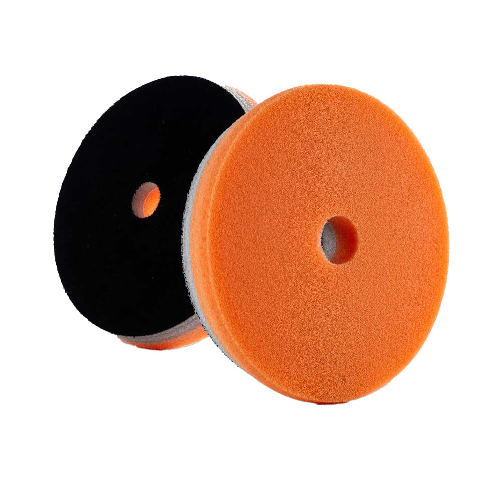 Lake Country HDO Orange polishing pad, 5.5-inch diameter, for cleaning and polishing vehicles. Bright orange, foam surface.