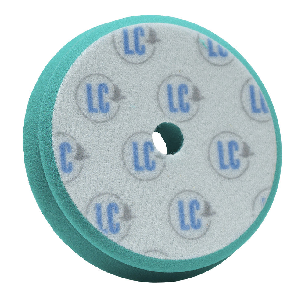 Lake Country ARC teal polishing pad, 6.5-inch size, used for automotive cleaning and polishing applications.