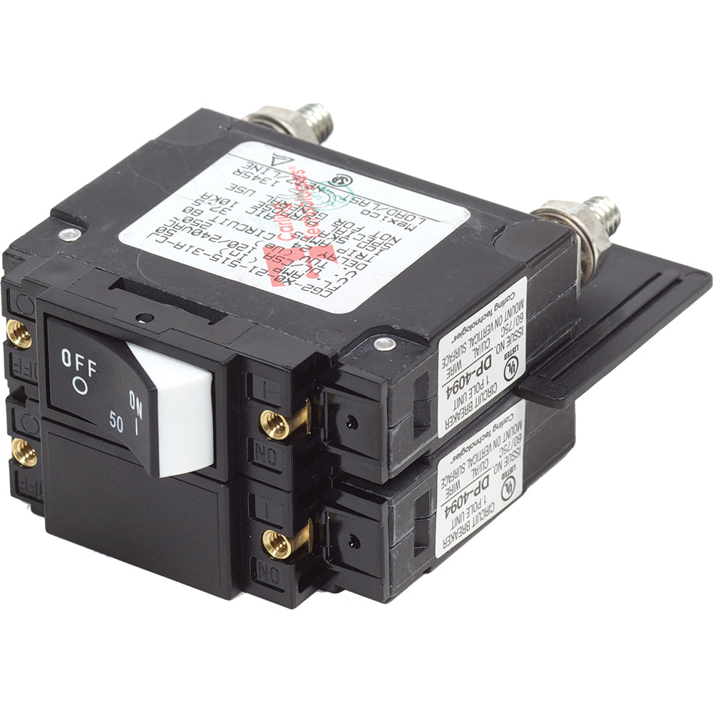 Blue Sea Systems 7467 UL-489 50A raised rocker circuit breaker mounted on panel, compact and durable electrical component.
