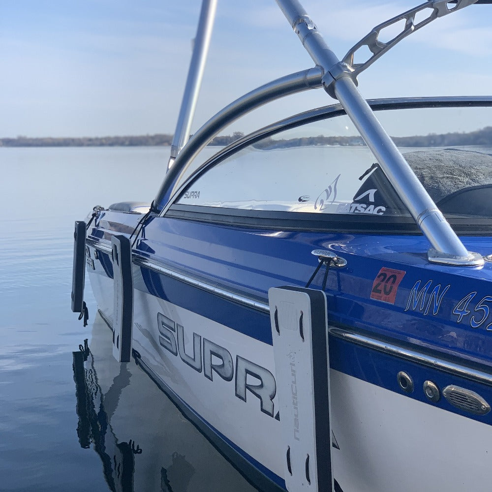 NautiFender flat boat fender by NautiCurl LLC, showing a sturdy, modular boat bumper designed to protect vessel sides.