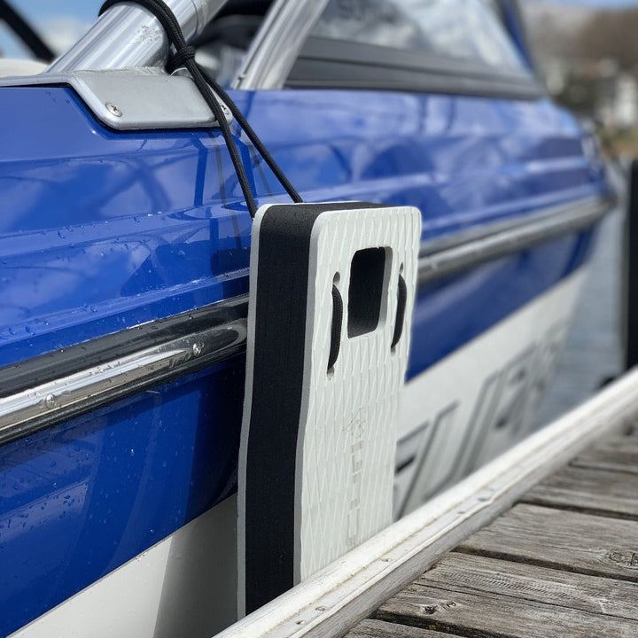 NautiFender modular flat boat fender by NautiCurl LLC, showing a close-up of the durable, white fender designed for boat protection.