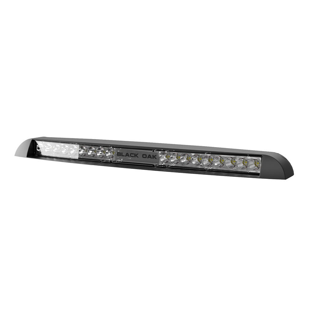Black Oak LED low profile marine spot light bar in black, designed for boats, mounted on a boat exterior for enhanced visibility.