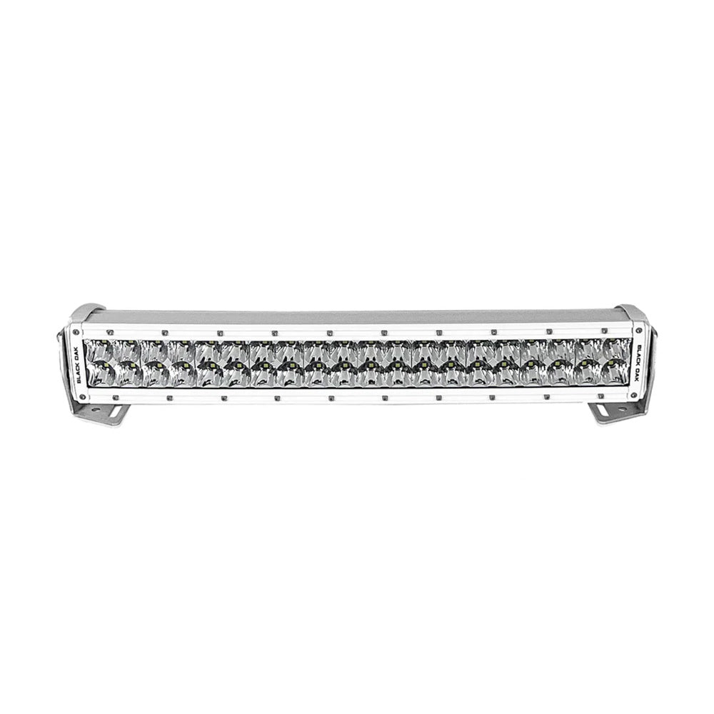 Black Oak LED Pro Series 3.0 curved double row 20-inch LED light bar with combo optics and white housing, designed for off-road lighting.