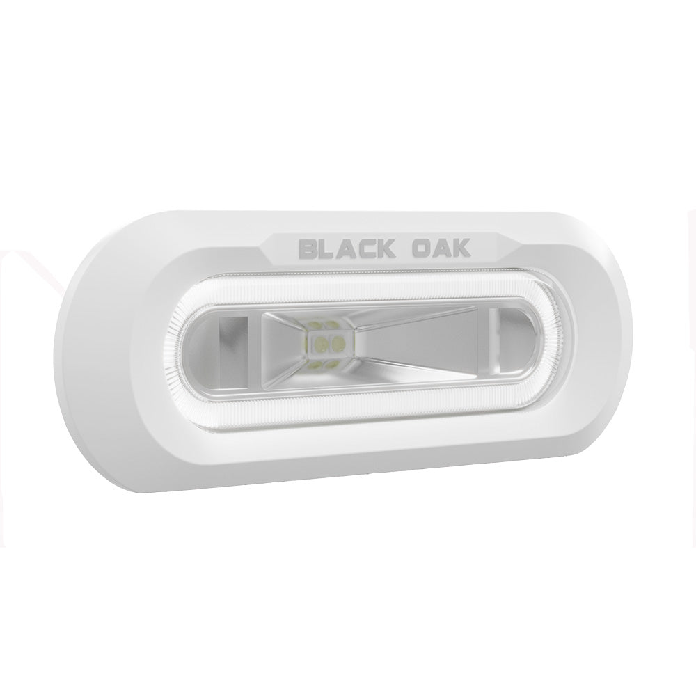 Black Oak LED underwater marine spreader light with white housing and white LED, flush mount design for boats.
