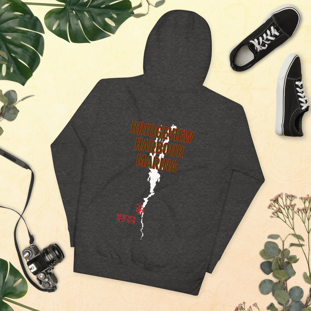 Black Bridgeview Harbour Marina midweight hoodie, casual apparel with logo, displayed on a hanger.