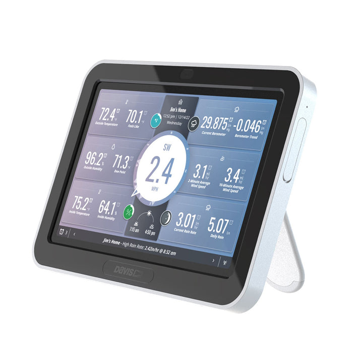 Davis Instruments WeatherLink Console displaying weather data on a digital screen with buttons and connectivity ports.