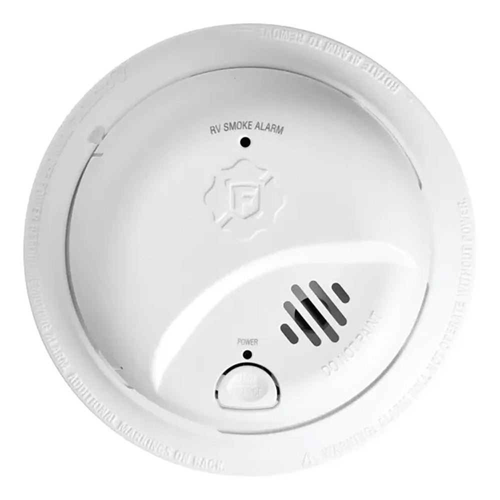 Fireboy-Xintex SMI100RV smoke detector with 9V battery, fume detector mounted on wall, safety device for residential use.