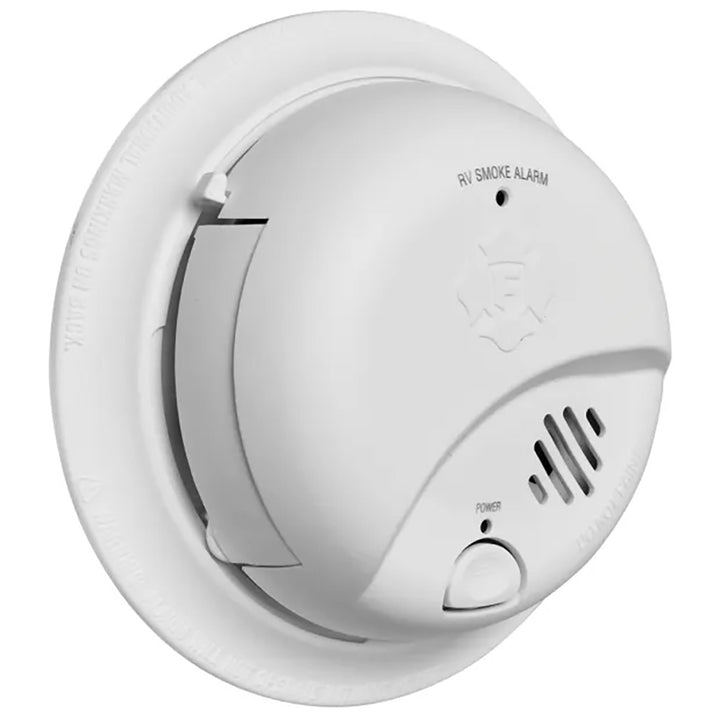 Fireboy-Xintex SMI100RV smoke detector with 9V battery, fume detection device for safety in residential or commercial spaces.