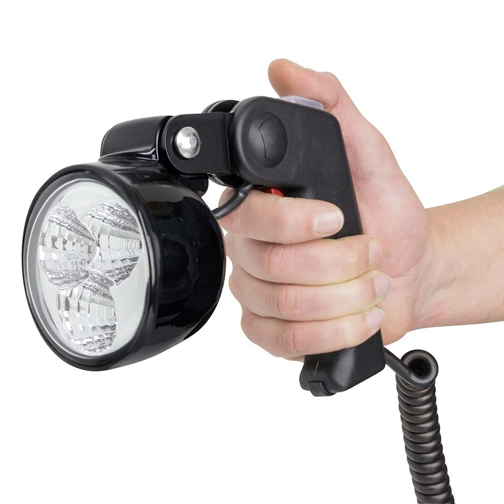 Hella Marine handheld search light with ergonomic handle and bright LED beam for marine or outdoor use.