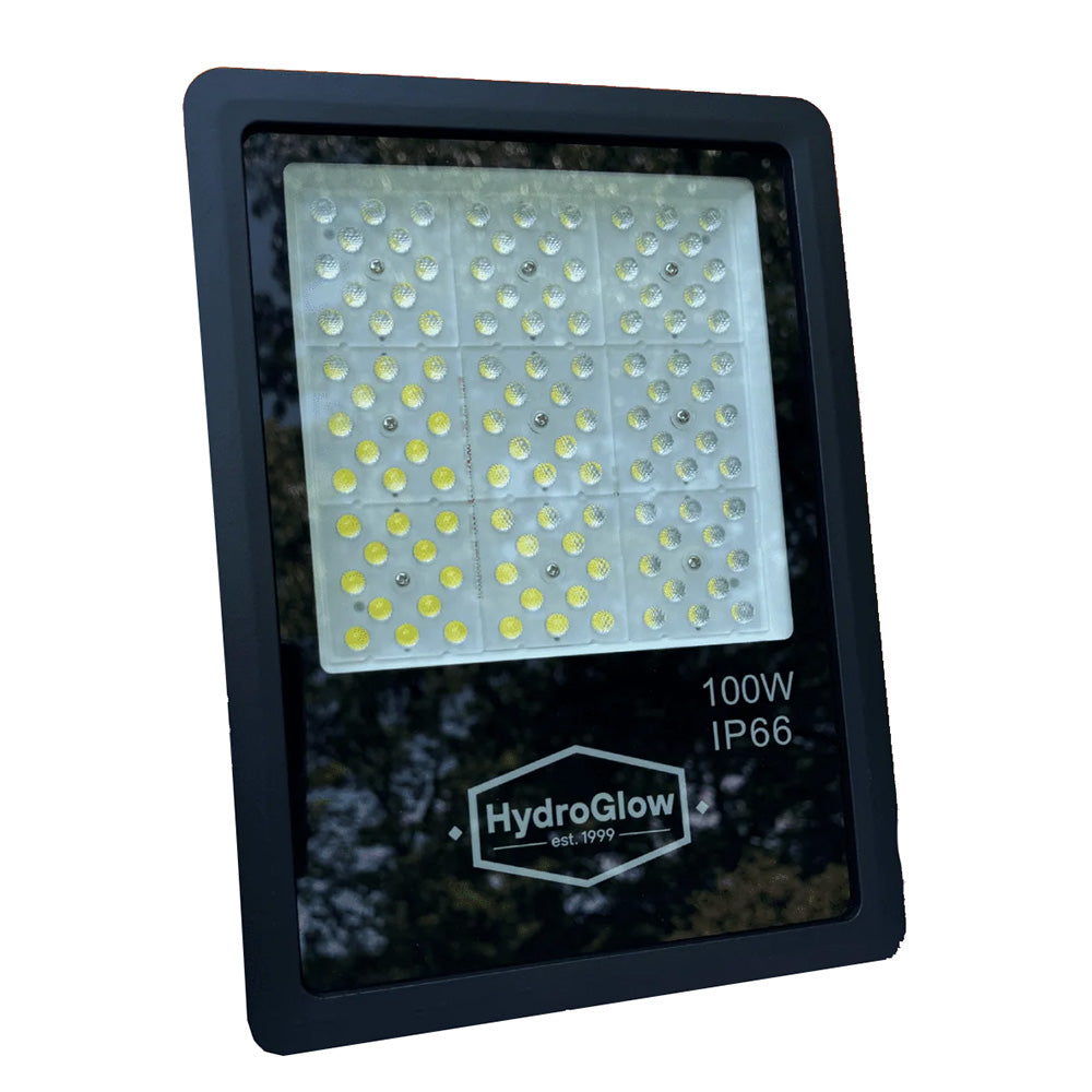 Hydro Glow 100W above-water LED floodlight in green, used for outdoor lighting, with a wide spread and durable design.