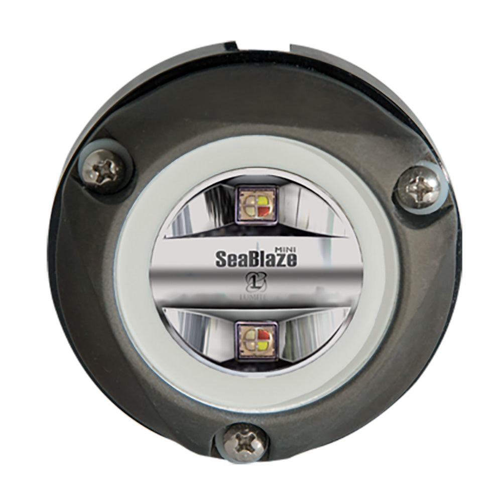 Lumitec Zambezi Mini underwater light with RGBW spectrum and PLI technology, surface-mounted on a boat hull.