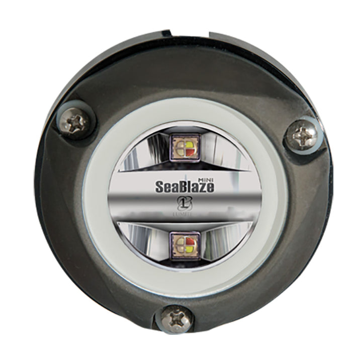 Lumitec Zambezi Mini underwater light with RGBW spectrum and PLI technology, surface-mounted on a boat hull.