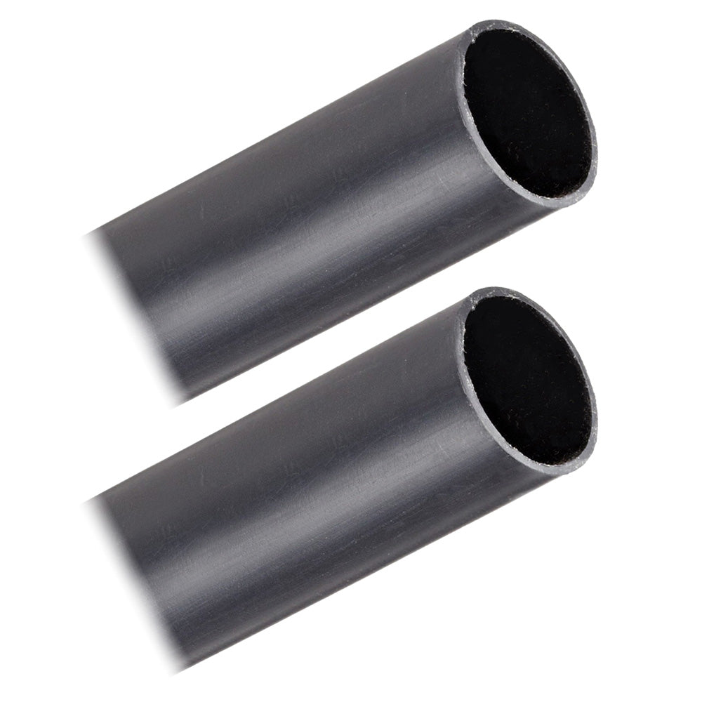 Two black 1" x 12" Pacer heavy wall heat shrink tubing for wire management, shown in a close-up for battery cable protection.