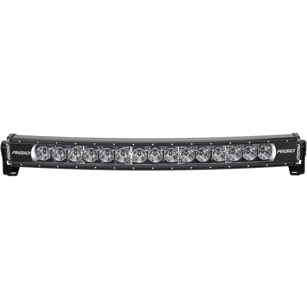 RIGID Industries Radiance + Curved 30-inch RGBW light bar mounted on vehicle, showcasing bright LED illumination and sleek design.