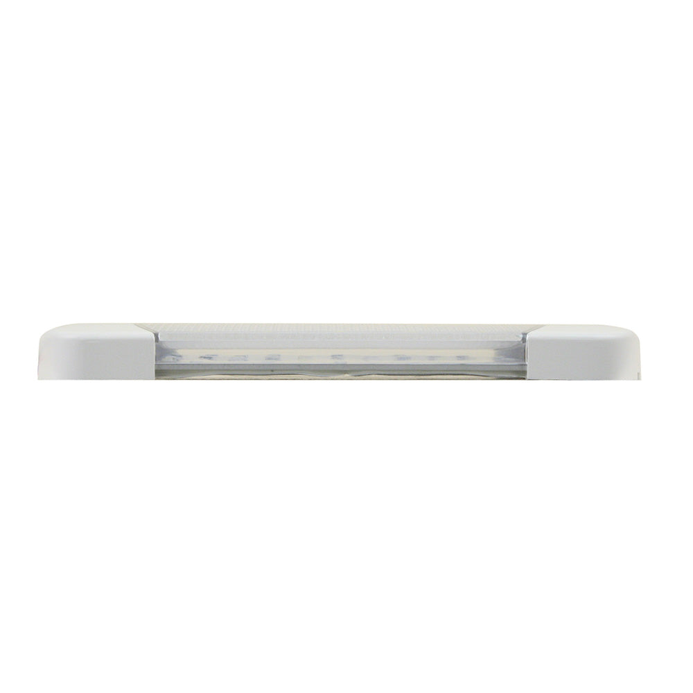 Scandvik utility light in cool white, 10-30V marine accessory, mounted on a boat with visible wiring and waterproof casing.