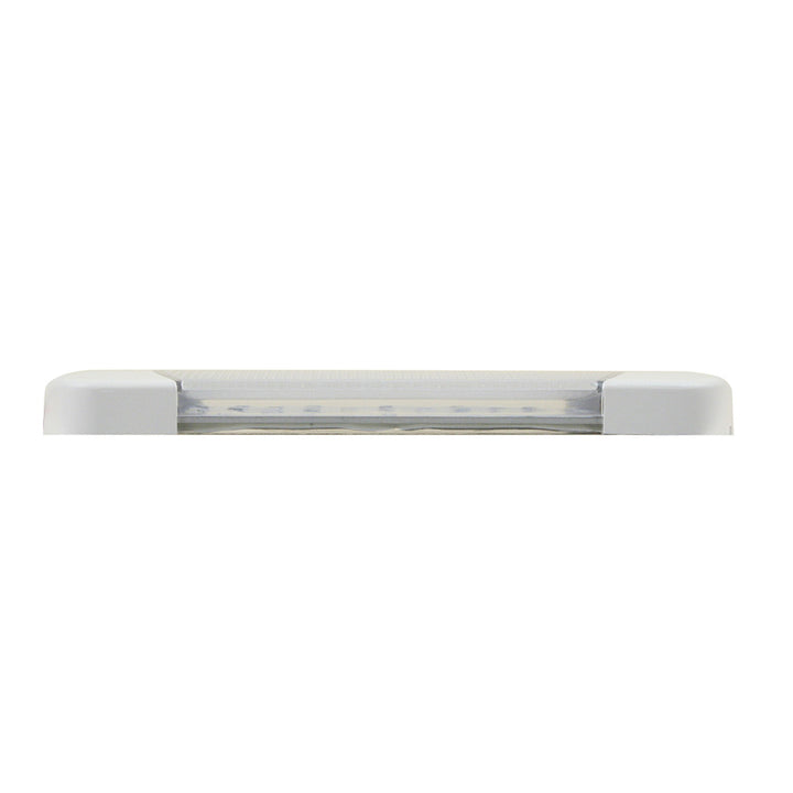 Scandvik utility light in cool white, 10-30V marine accessory, mounted on a boat with visible wiring and waterproof casing.