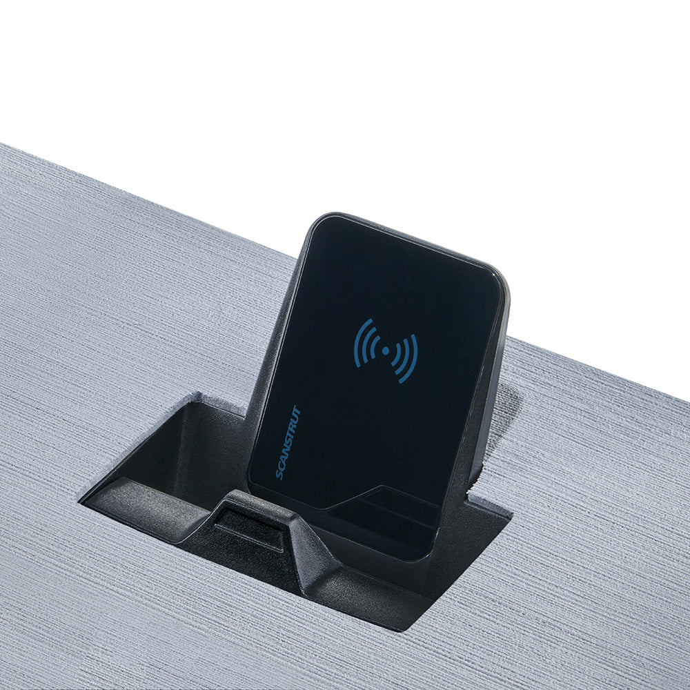 Scanstrut Aura magnetic wireless charger with 10W power, 12/24V compatible, shown as a sleek metallic accessory for charging devices.