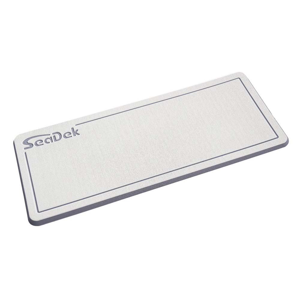 SeaDek Large Helm Pad for deck or galley, in Cool Grey and Storm Grey, made by SeaDek, shown on boat surface.
