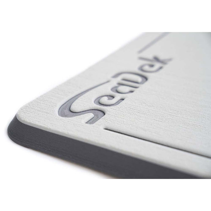 SeaDek Large Helm Pad for deck and galley, in cool grey and storm grey, made by SeaDek, shown on boat surface.