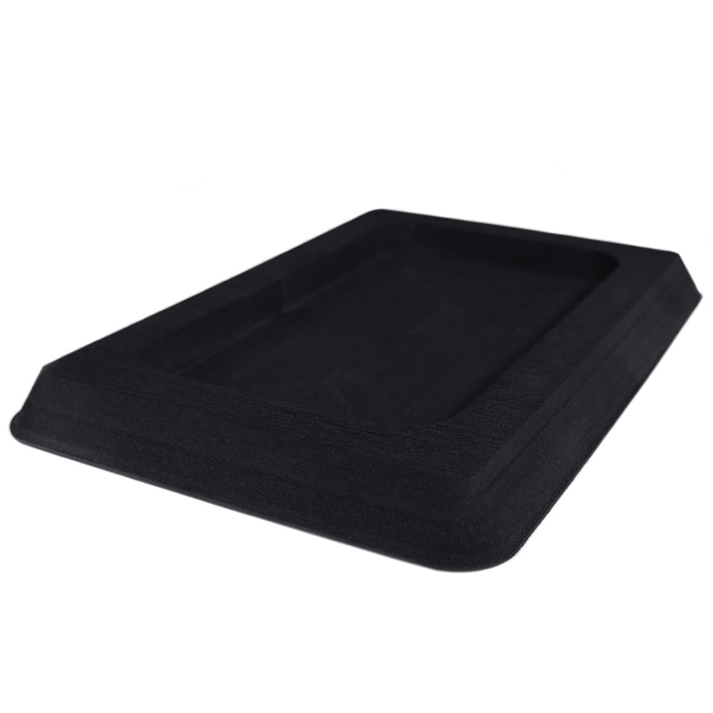 SeaDek Single Cell Phone Dash Pocket in black attached to boat deck or galley, designed for secure phone storage.