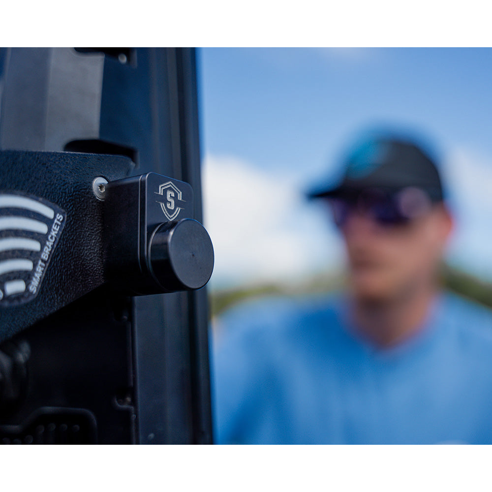 Secure Outdoors Elite Lock dual universal trolling motor lock in black, designed to secure and protect trolling motors outdoors.