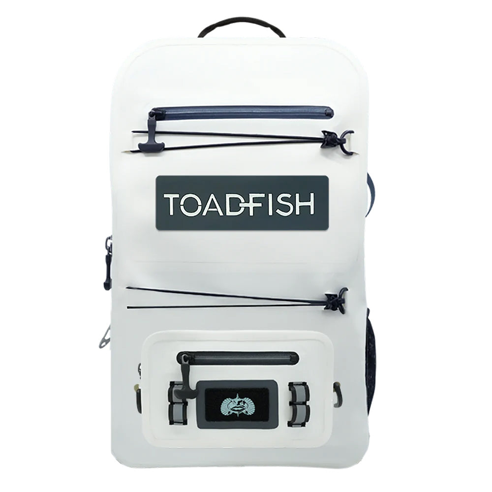 Toadfish waterproof backpack and sling in sea shell color, durable accessories for outdoor adventures and water activities.