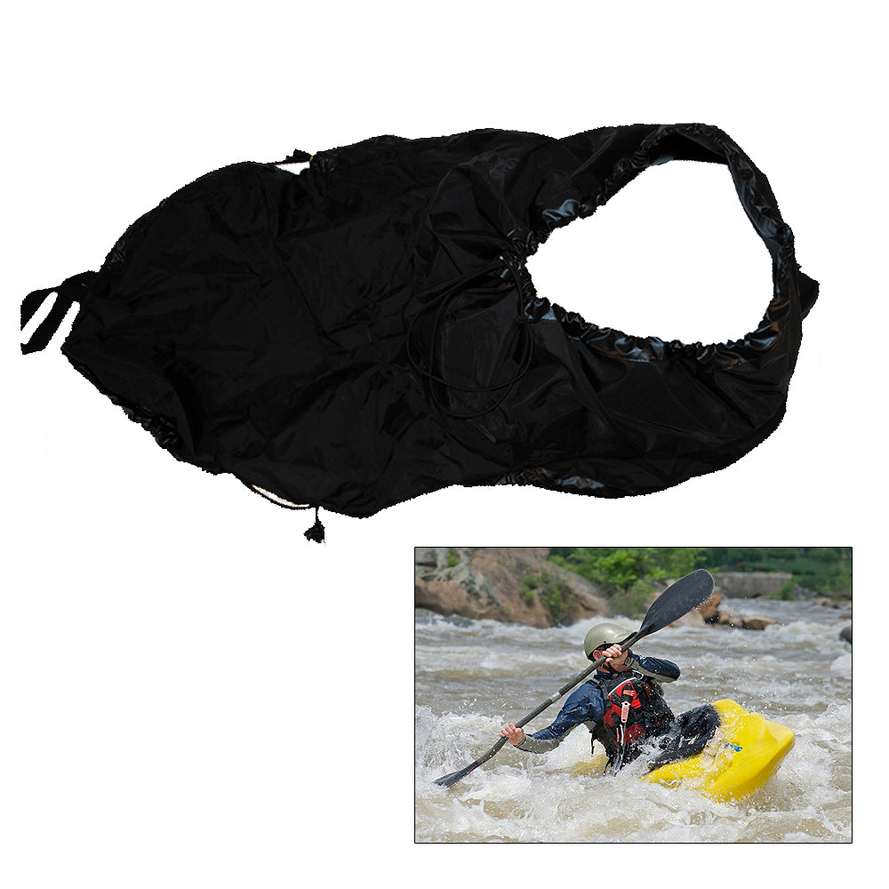Attwood Marine black universal fit kayak spray skirt attached to a kayak, designed to keep water out during paddling.