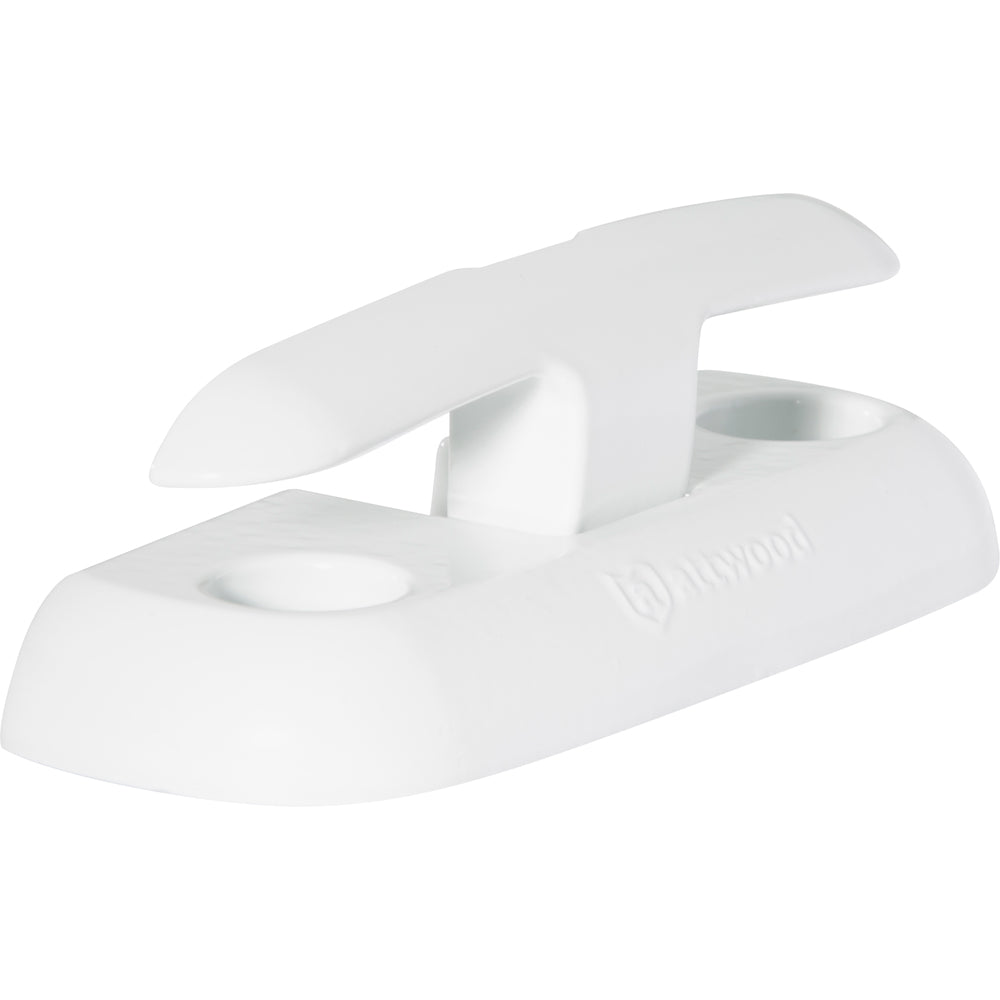 Attwood Marine 6-inch fold-down dock cleat mounted on a boat dock, made of durable metal for secure mooring.