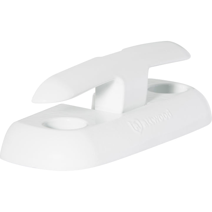 Attwood Marine 6-inch fold-down dock cleat mounted on a boat dock, made of durable metal for secure mooring.