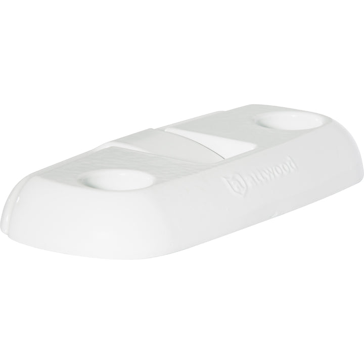 Attwood Marine 6-inch fold-down dock cleat mounted on a boat dock, designed for secure boat tie-up and easy fold-away storage
