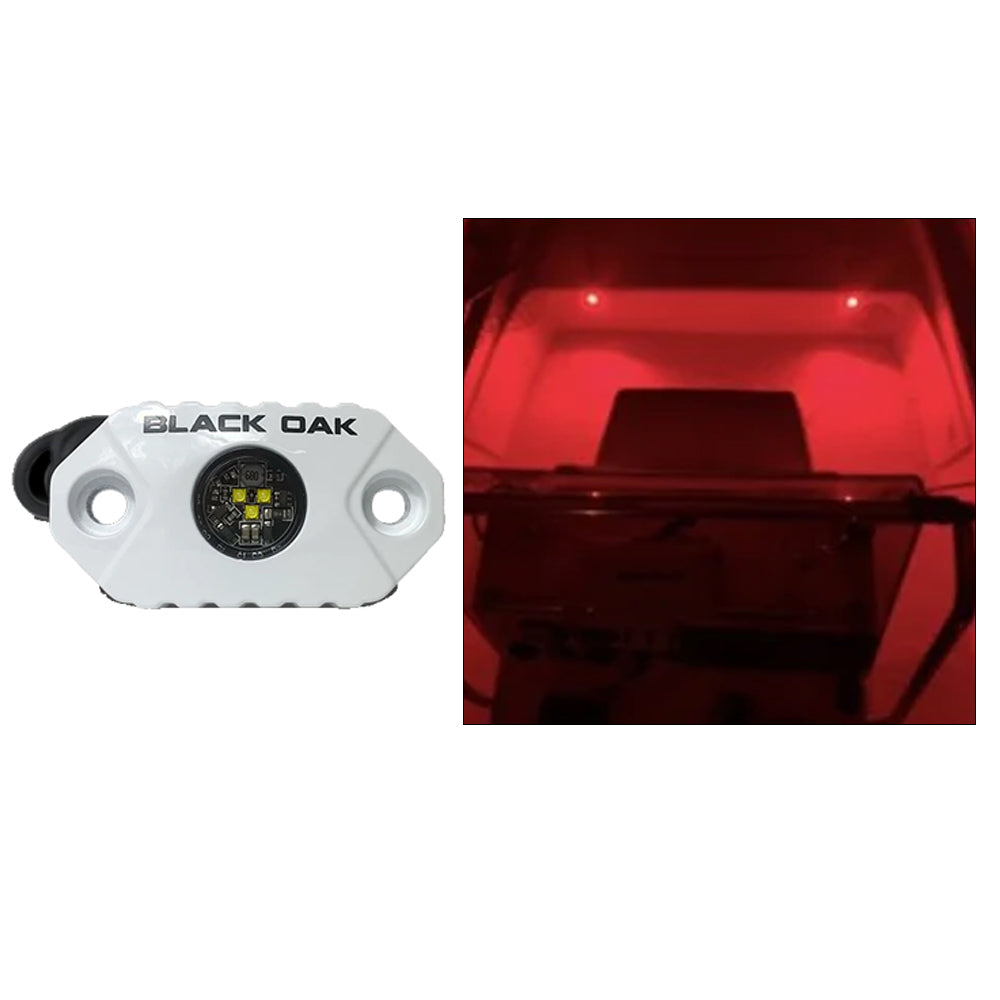 Black Oak LED interior courtesy light featuring red LEDs and white housing, used as an accent or courtesy light in vehicles.