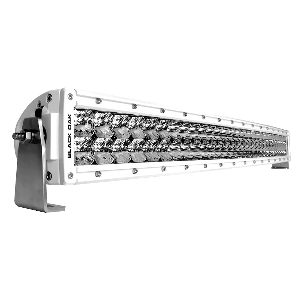 Black Oak LED Pro Series 3.0 curved double row 30-inch LED light bar with combo optics and white housing for vehicle lighting.