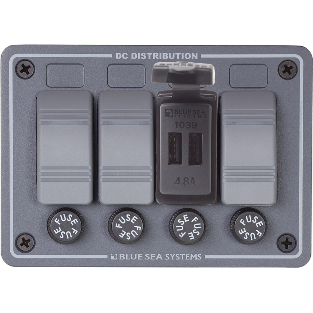 Blue Sea Systems dual USB charger mounted in a 24V Contura panel, designed for marine or vehicle accessories.