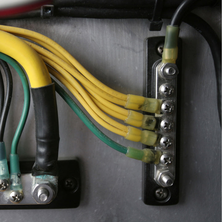 Blue Sea 2304 MiniBus 100 Ampere common busbar with 5 x 8-32 screw terminals for electrical connections.