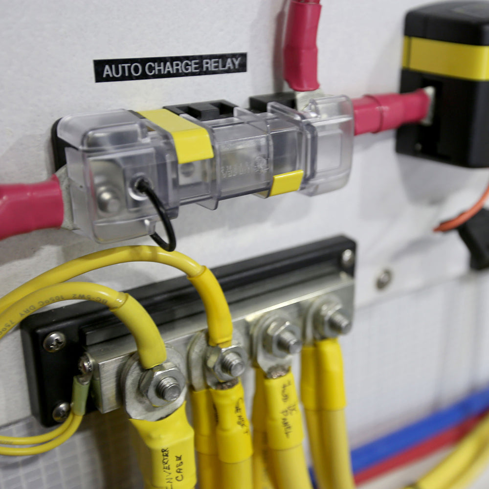 Blue Sea Systems 7720 MIDI/AMI Safety Fuse Block with multiple fuse slots and clear labeling for marine electrical safety.
