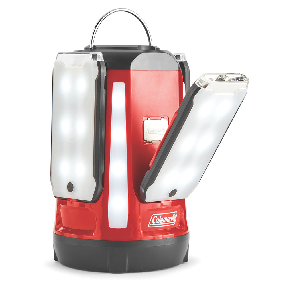 Coleman Quad Pro 800L LED Panel Lantern with four bright panels and handle for outdoor camping and emergency lighting.