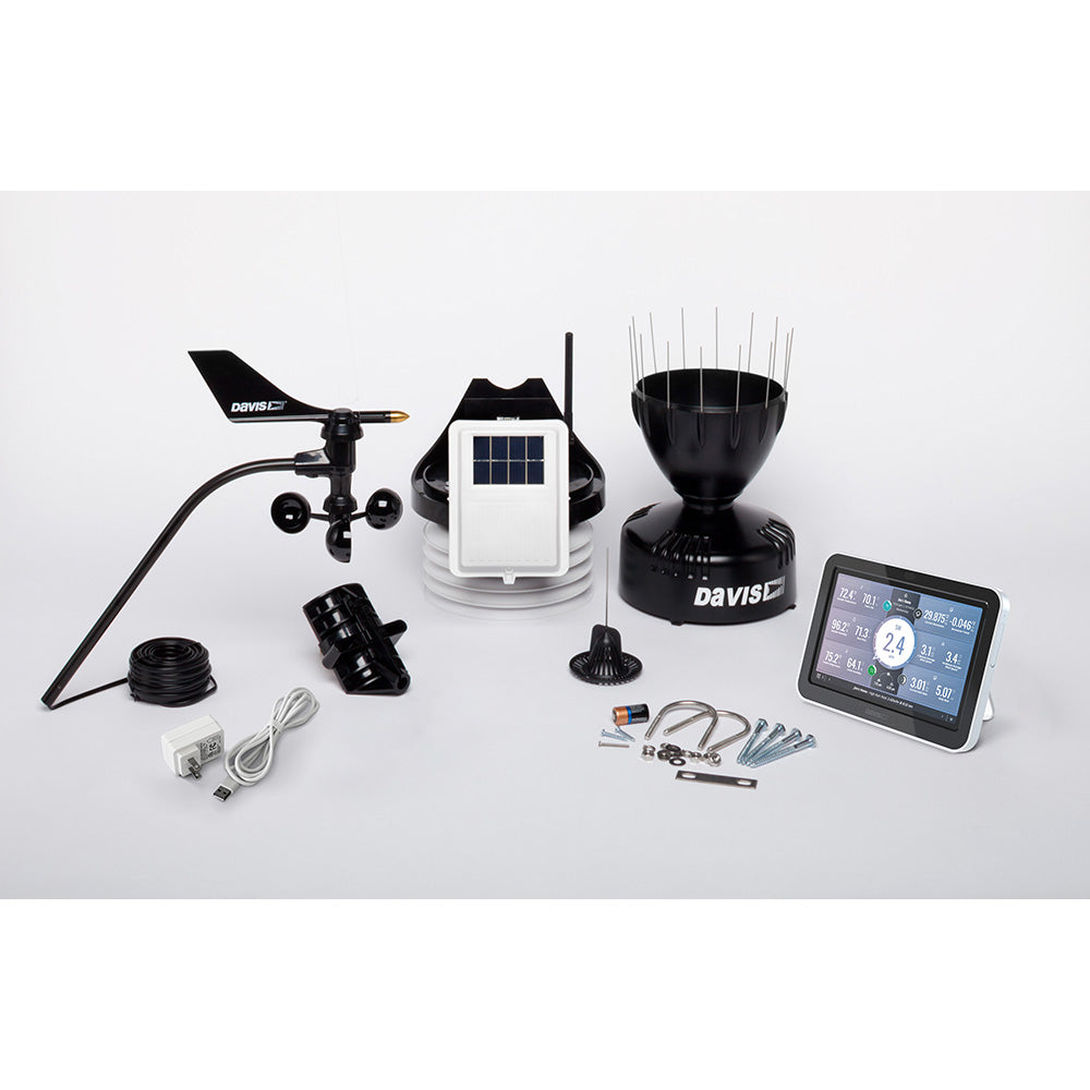 Davis Instruments Vantage Pro2 Wireless Weather Station with WeatherLink console and standard radiation shield showing outdoor sensors and display.