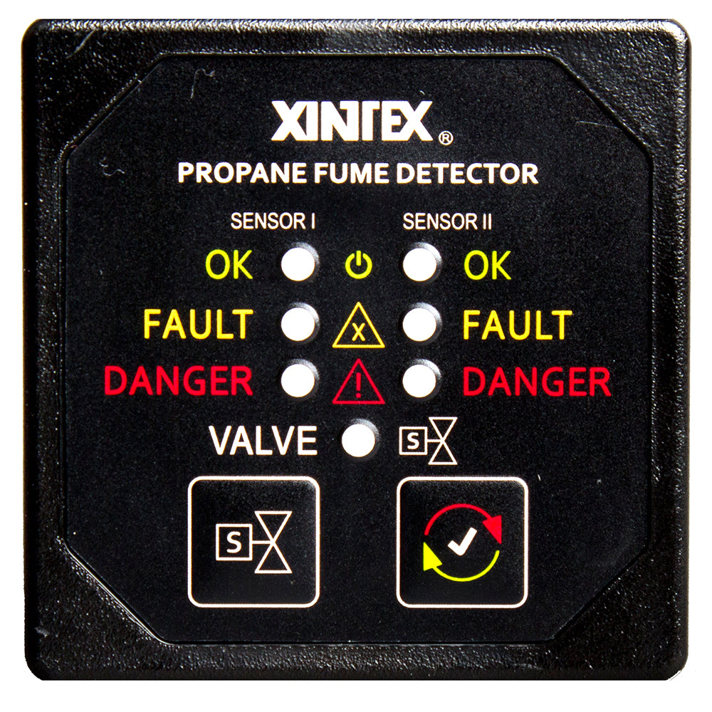 Fireboy-Xintex propane fume detector alarm with square black bezel, two plastic sensors, and solenoid valve for safety monitoring.