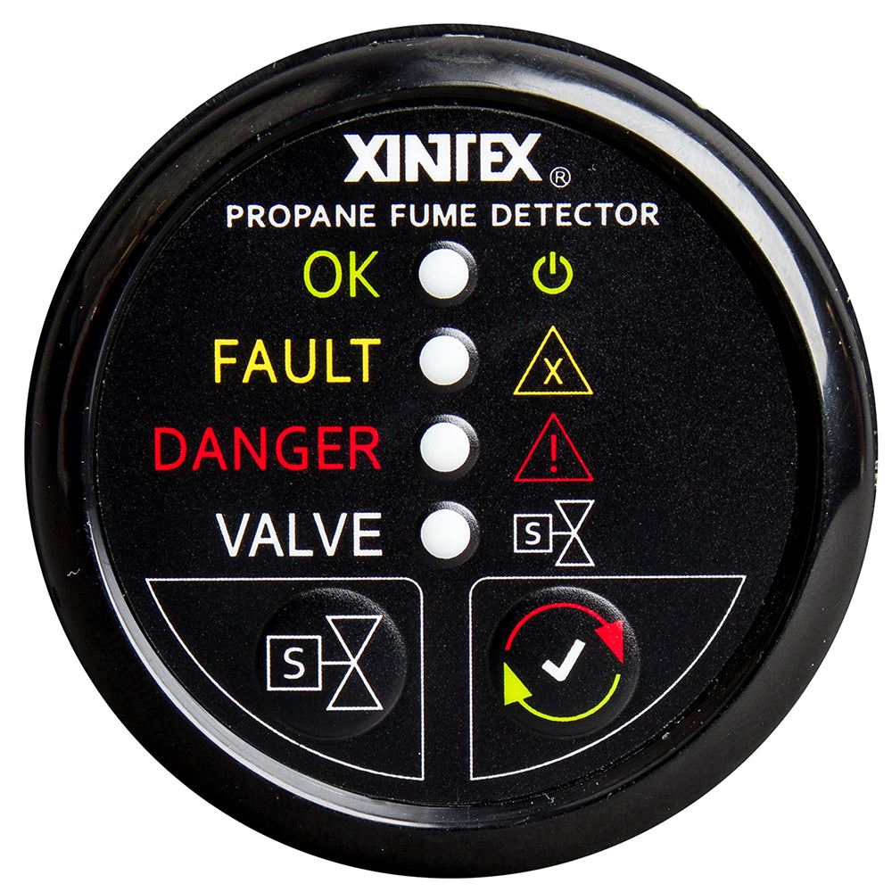 Fireboy-Xintex propane fume detector with plastic sensor, solenoid valve, and black bezel display for safety monitoring.