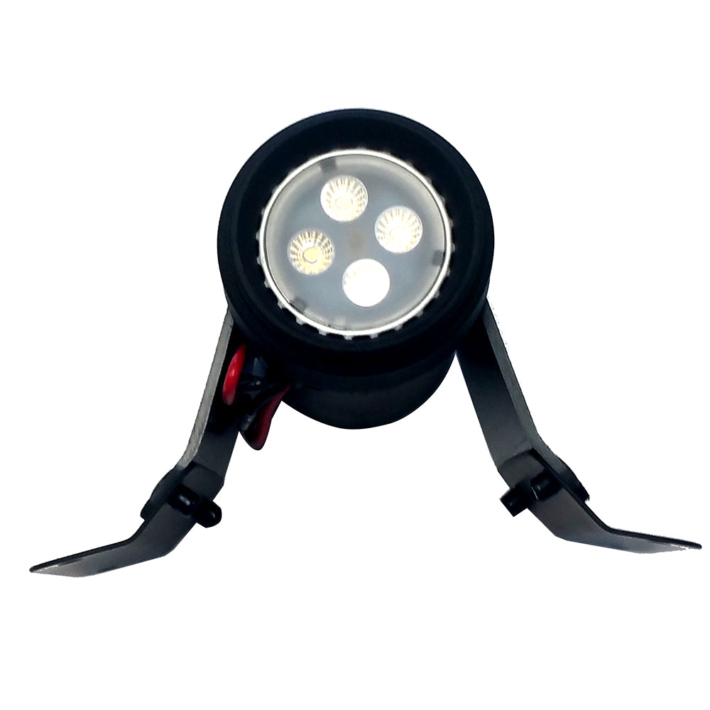 Forespar ML-1 LED flood/spreader deck light mounted on boat deck, showcasing bright white marine lighting for navigation and safety.