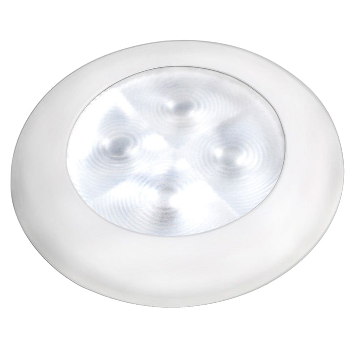 Hella Marine Slim Line LED round courtesy lamp with white LED light, white plastic bezel, 12V interior courtesy lighting.