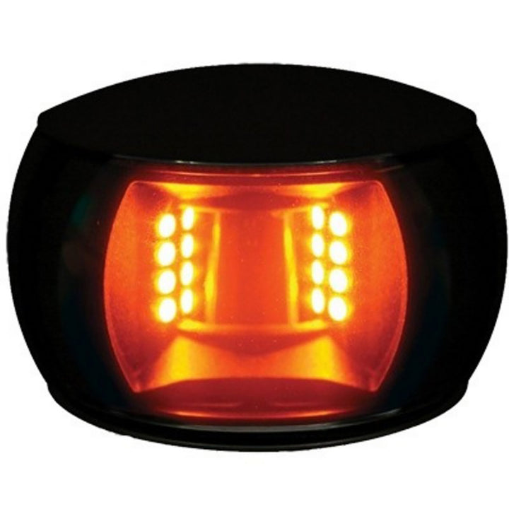 Hella Marine NaviLED Compact 2nm towing navigation lamp with black shroud, marine navigation lights for boats.