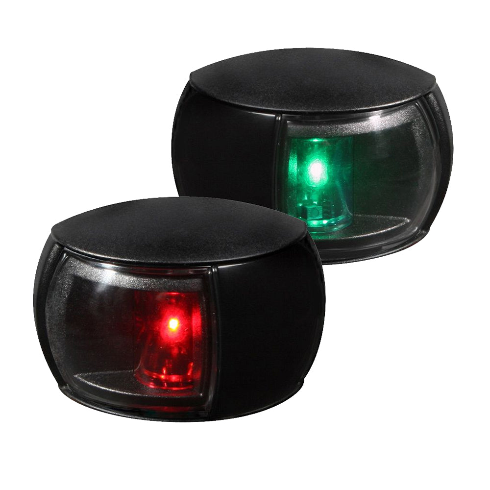 Hella Marine NaviLED port and starboard navigation lights with clear lenses and black housing, visible in a boat navigation setup.