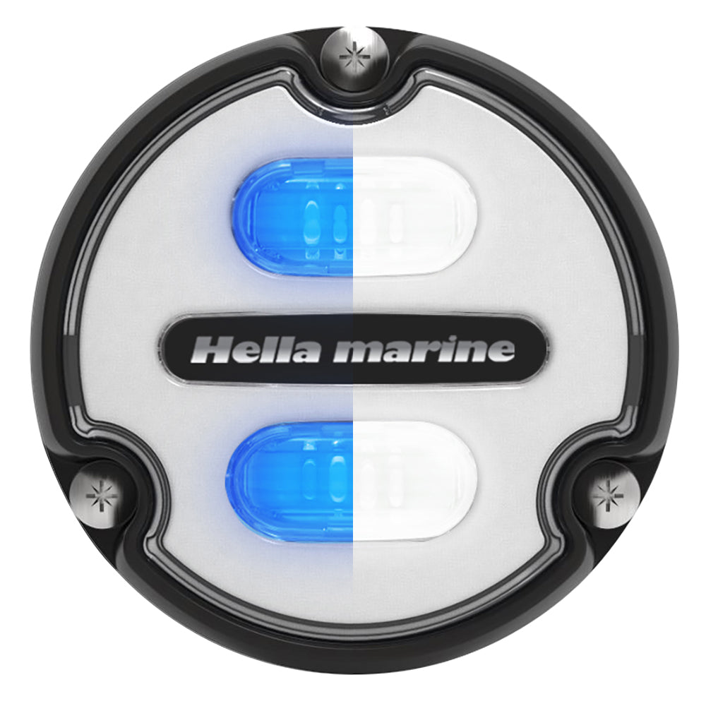 Hella Marine Apelo A1 underwater light with black housing and white lens, emitting blue-white light, 1800 lumens, for marine boats.