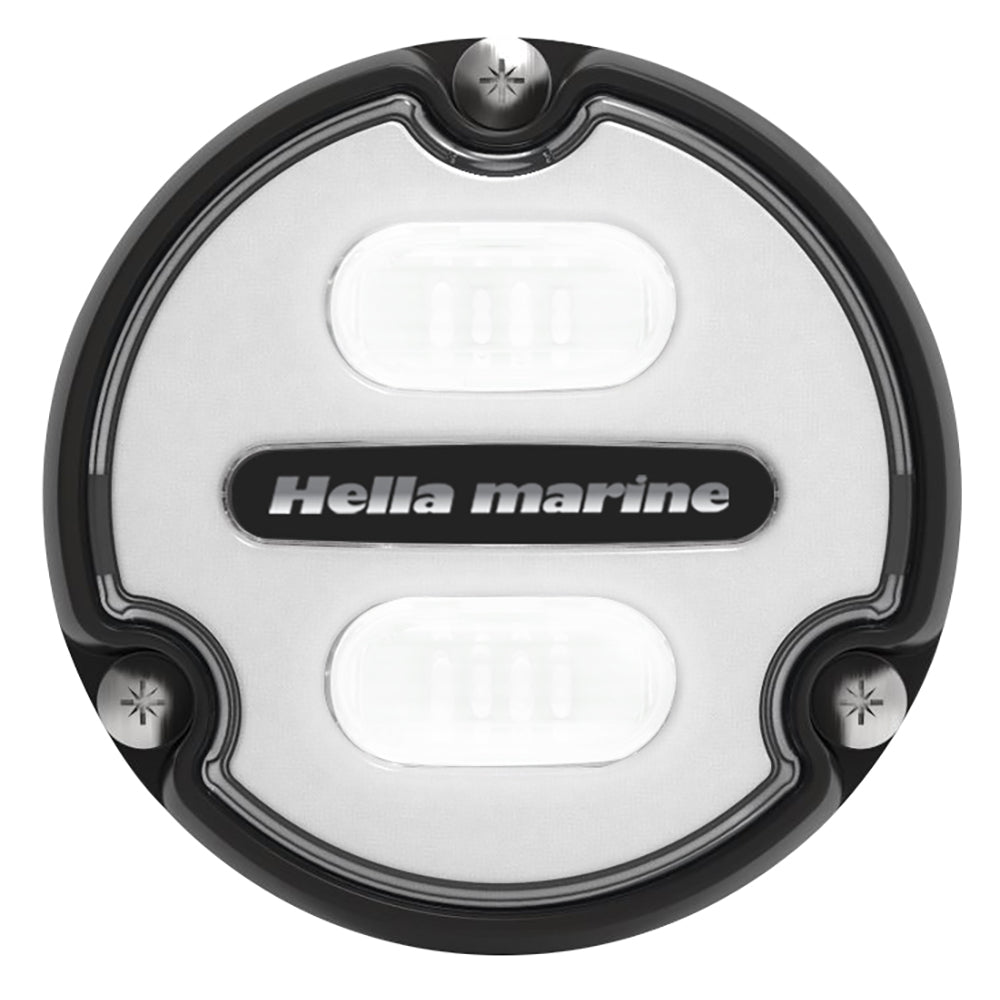Hella Marine Apelo A1 underwater light with black housing and white lens, emitting 1800 lumens in blue-white color.