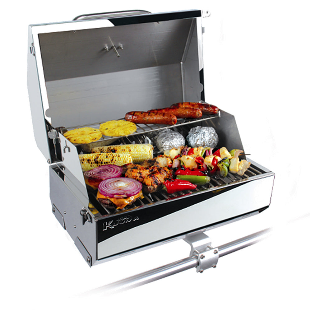 Kuuma Elite 216 gas grill on deck or galley setup, stainless steel construction, with grilling surface and control knobs visible.