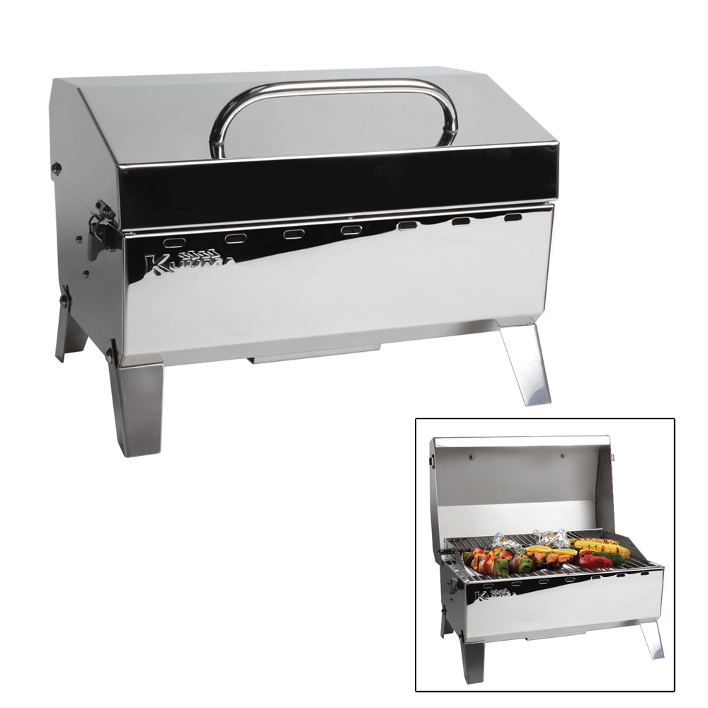 Kuuma Stow N Go 125 compact gas grill on deck, black metal construction, portable design for outdoor cooking and grilling.