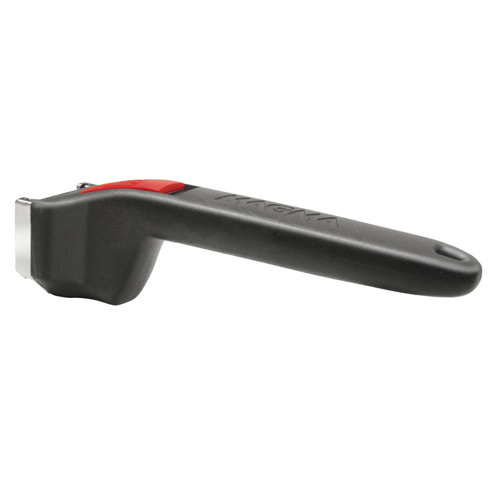 Magma removable cookware handle attached to a deck or galley setup, stainless steel construction, for secure cooking vessel handling.