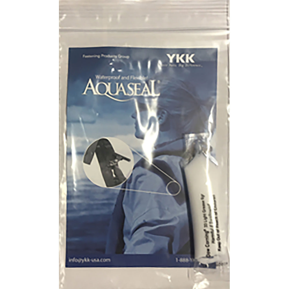 Mustang Survival waterproof zipper lubricant accessory with YKK branding, designed to keep waterproof zippers functioning smoothly.